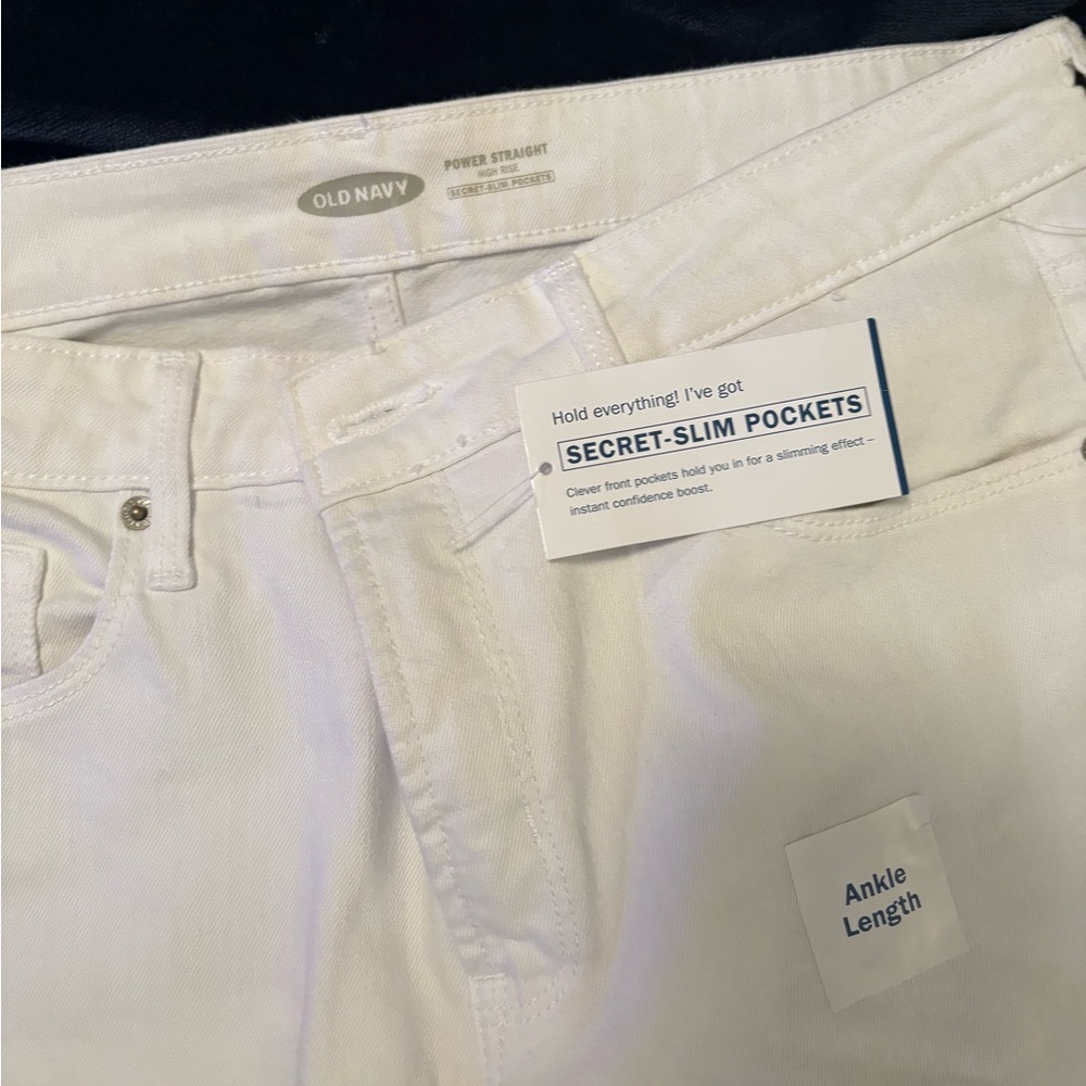 Size 12 Old Navy Power Slim-Straight ankle length jeans. Frayed ankle finish.